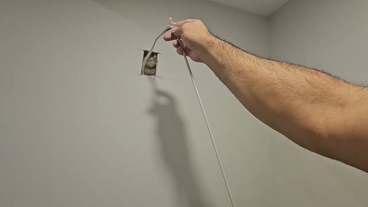 How to add a plug in the wall behind the TV