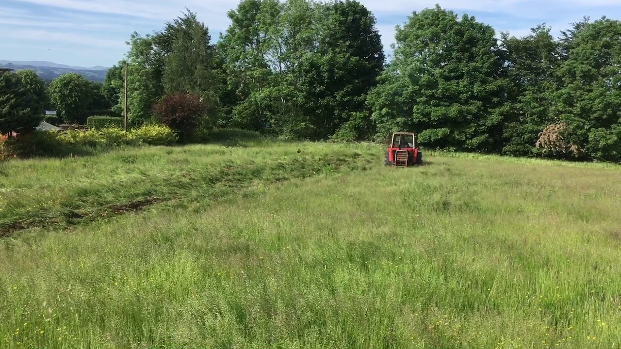 Massey Ferguson 565 with Howard 1550 rotaspreader