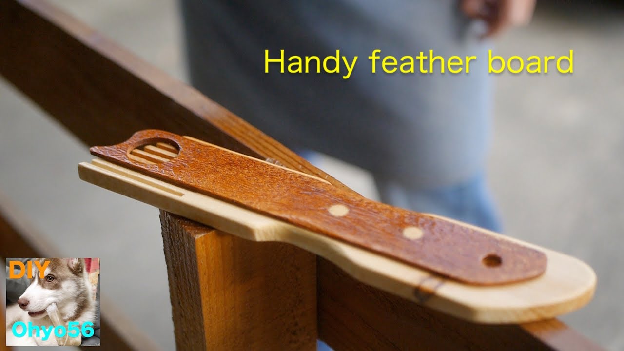 Handheld feather board