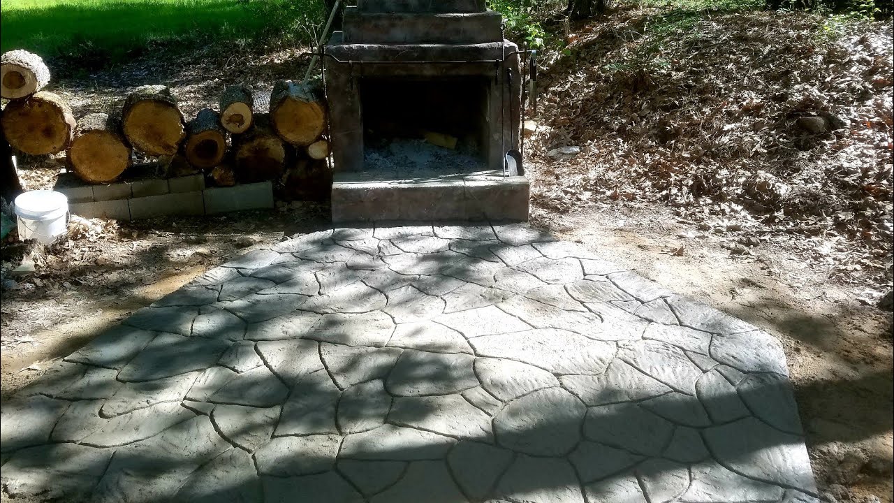 Formless patio hand carved to look like stone.