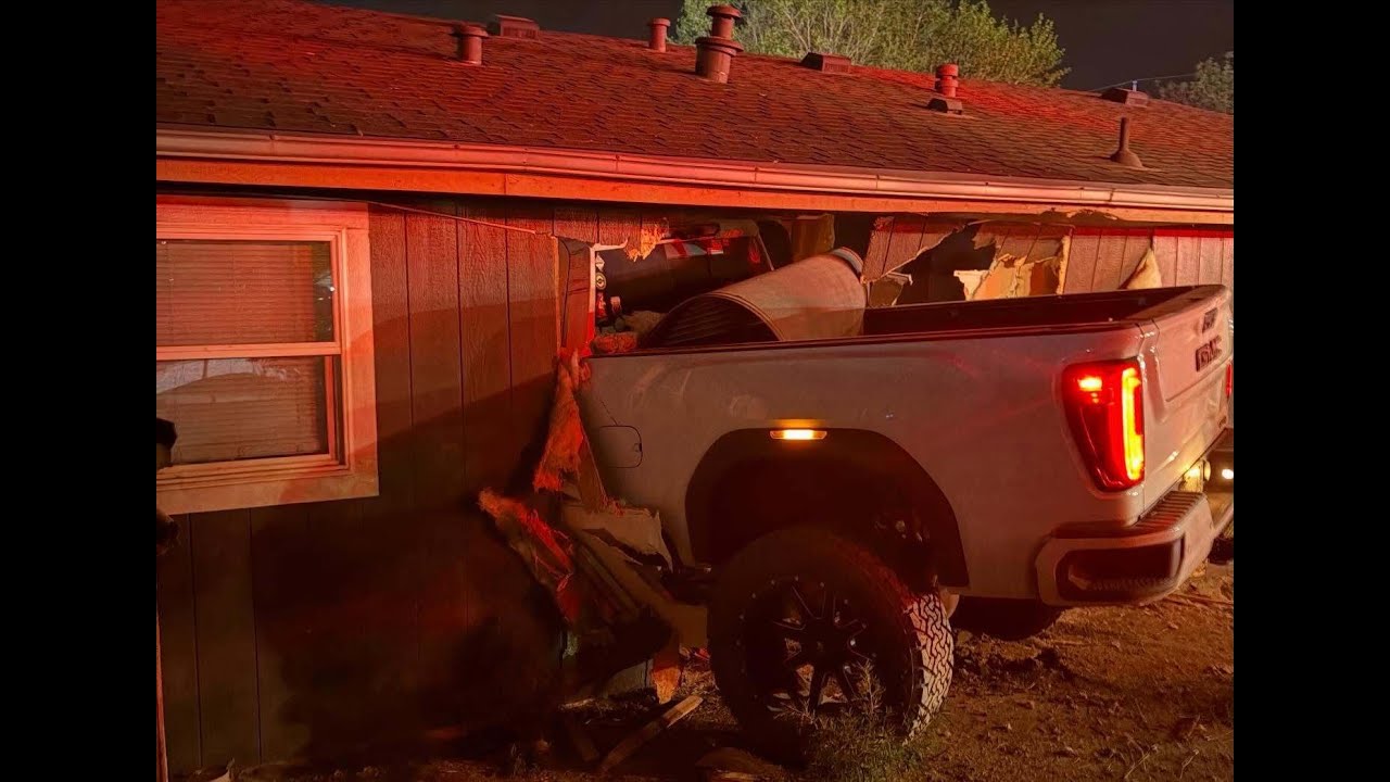 Driver facing charges after multi-vehicle crash, crashing into Denver metro area home