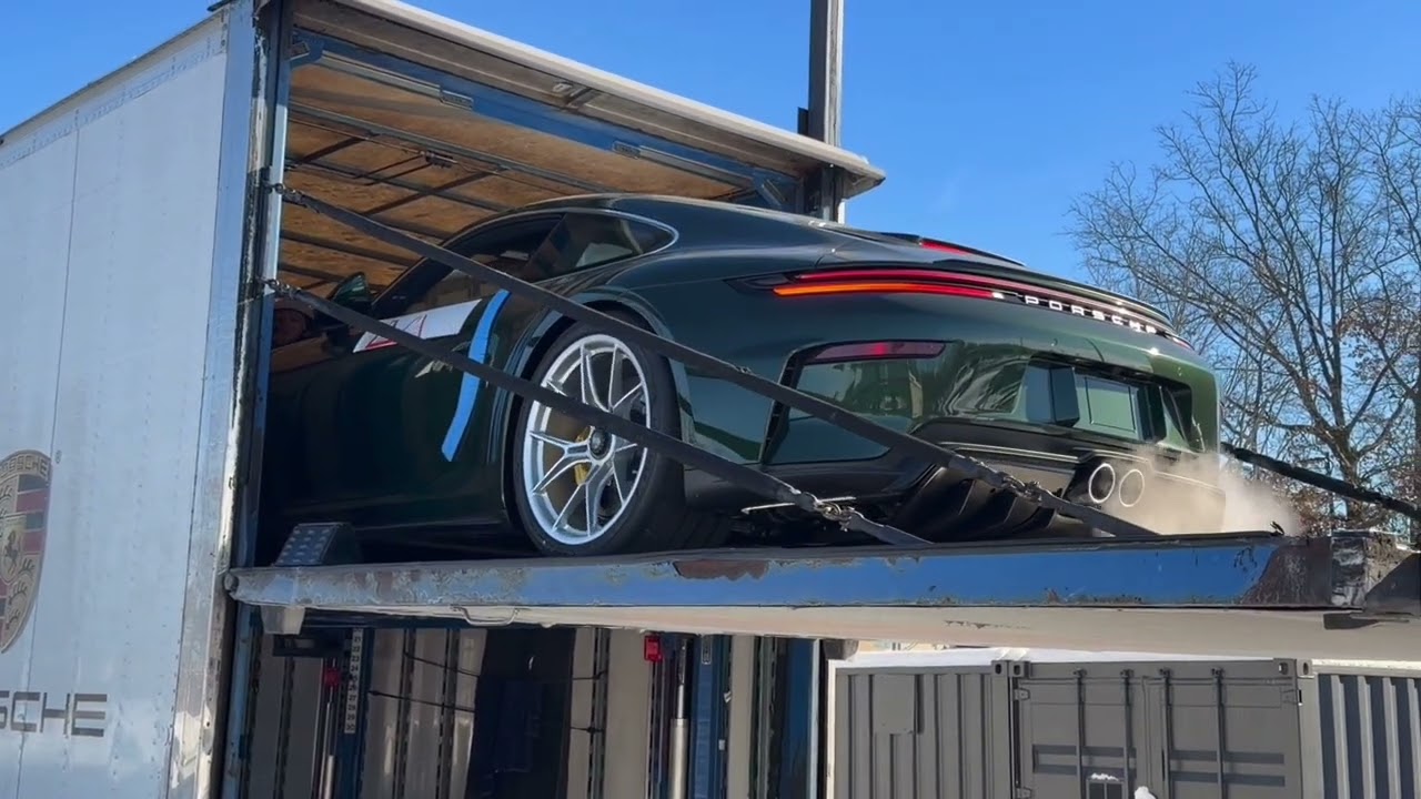 Unloading my 2026 Porsche 911 GT3 Touring in Oak Green Neo Metallic from the Transport Truck