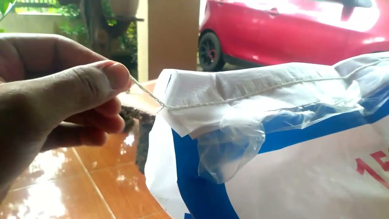 Cara membuka karung pakan ikan || Tehnik membuka karung pelet