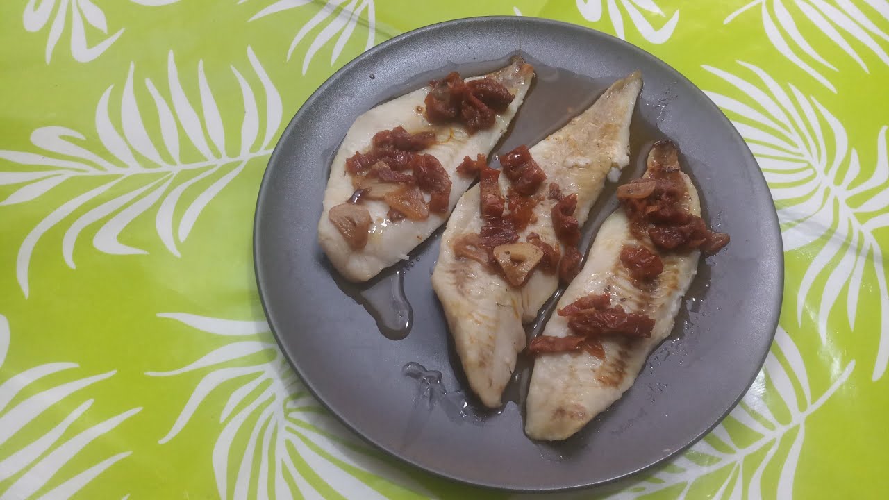 MERLUZA con TOMATES SECOS