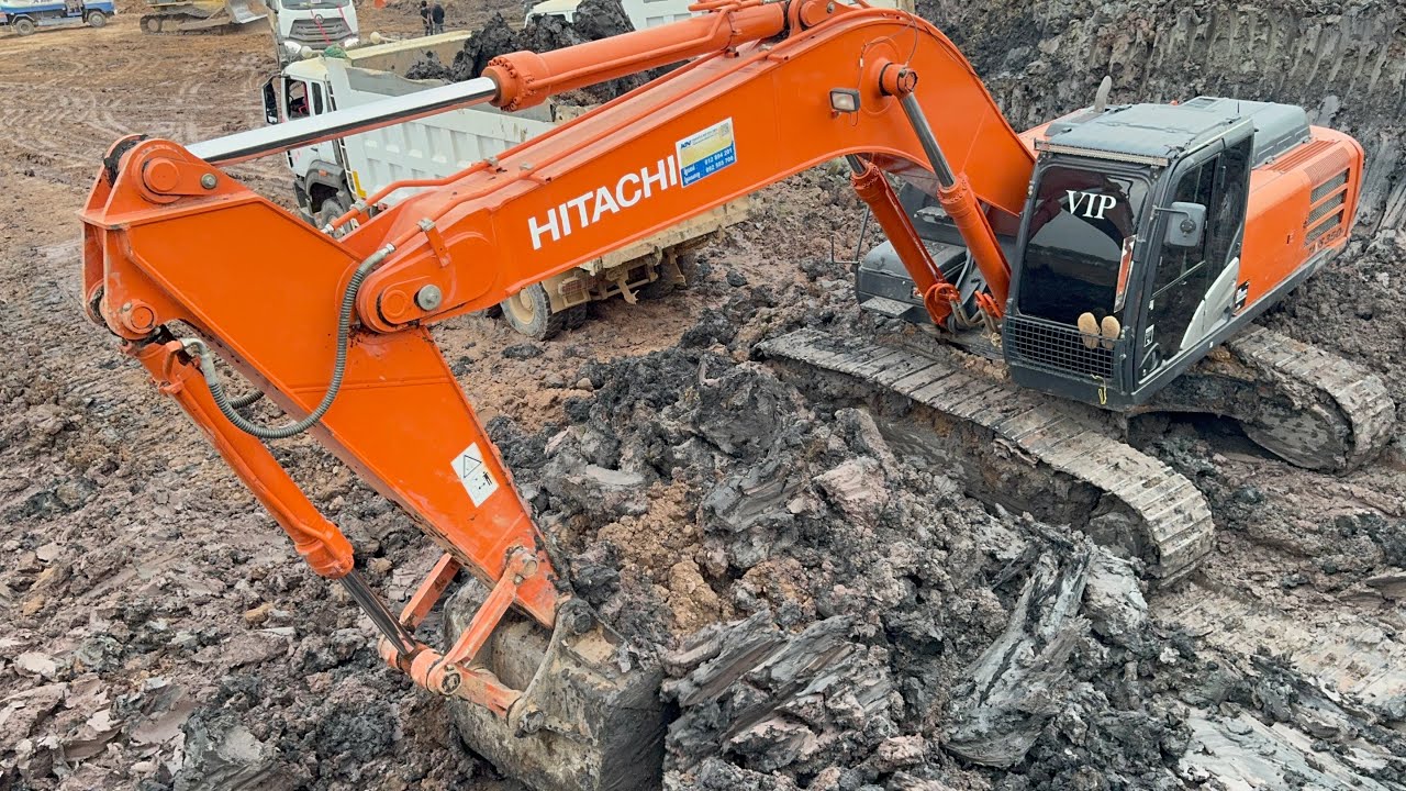 HITACHI ZAXIS 350 Excavator Working Hard with Multiple 41 Ton Dump Trucks at Special Job Site!