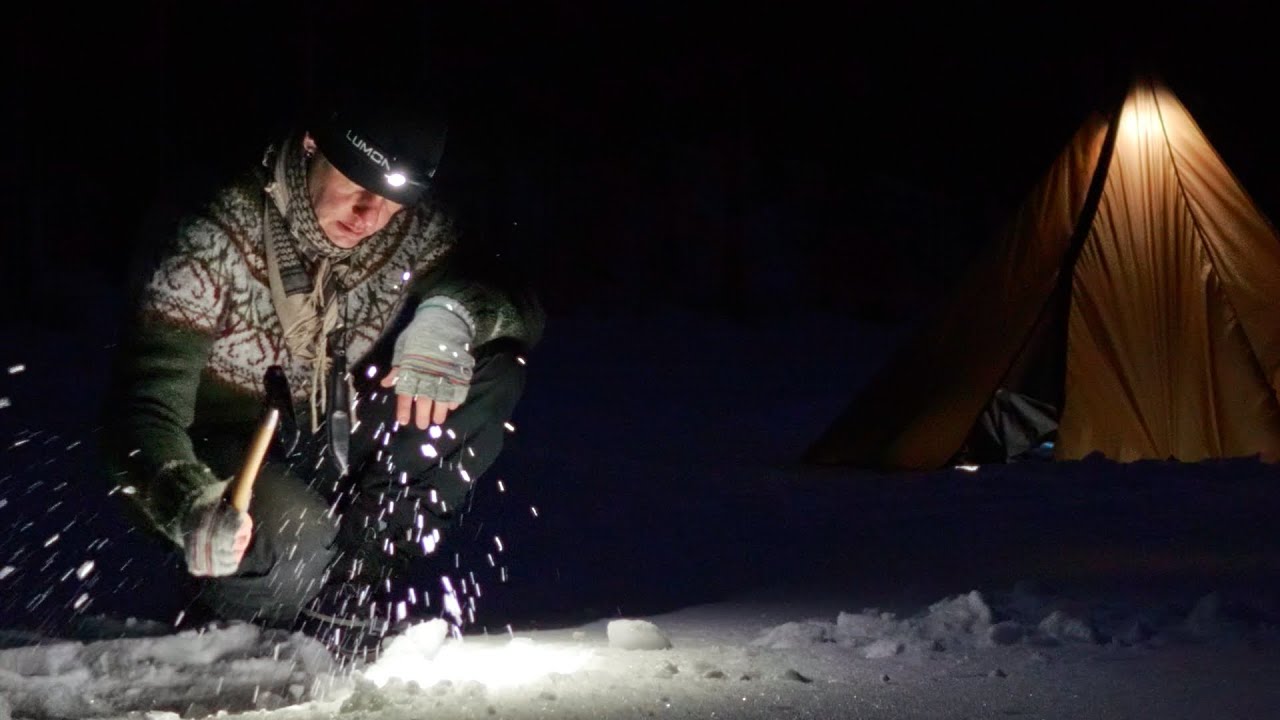 Leiri järven jäällä - Teltan pystytys nauloilla