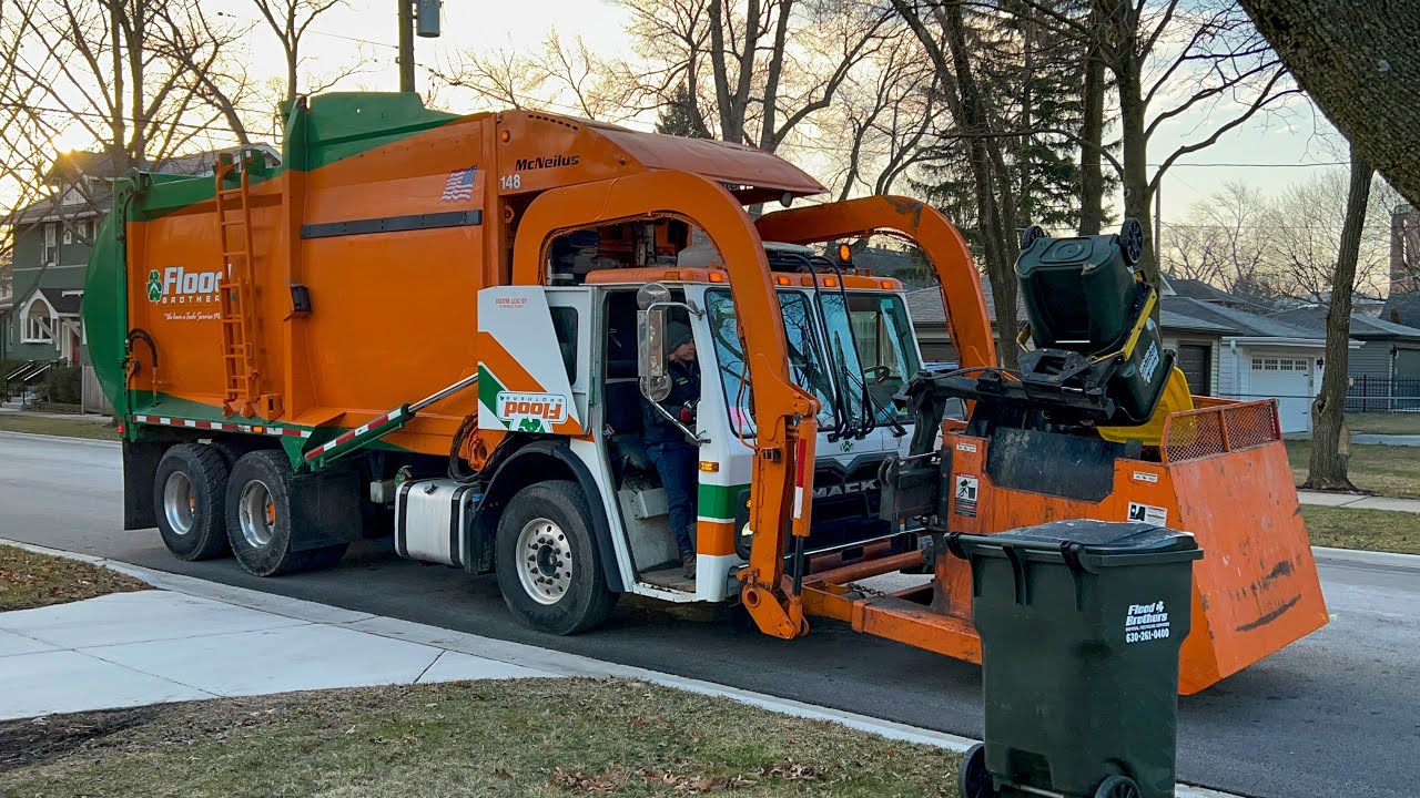 Flood Brothers New Look on a Mack LEU McNeilus Contender Curotto Can Garbage Truck