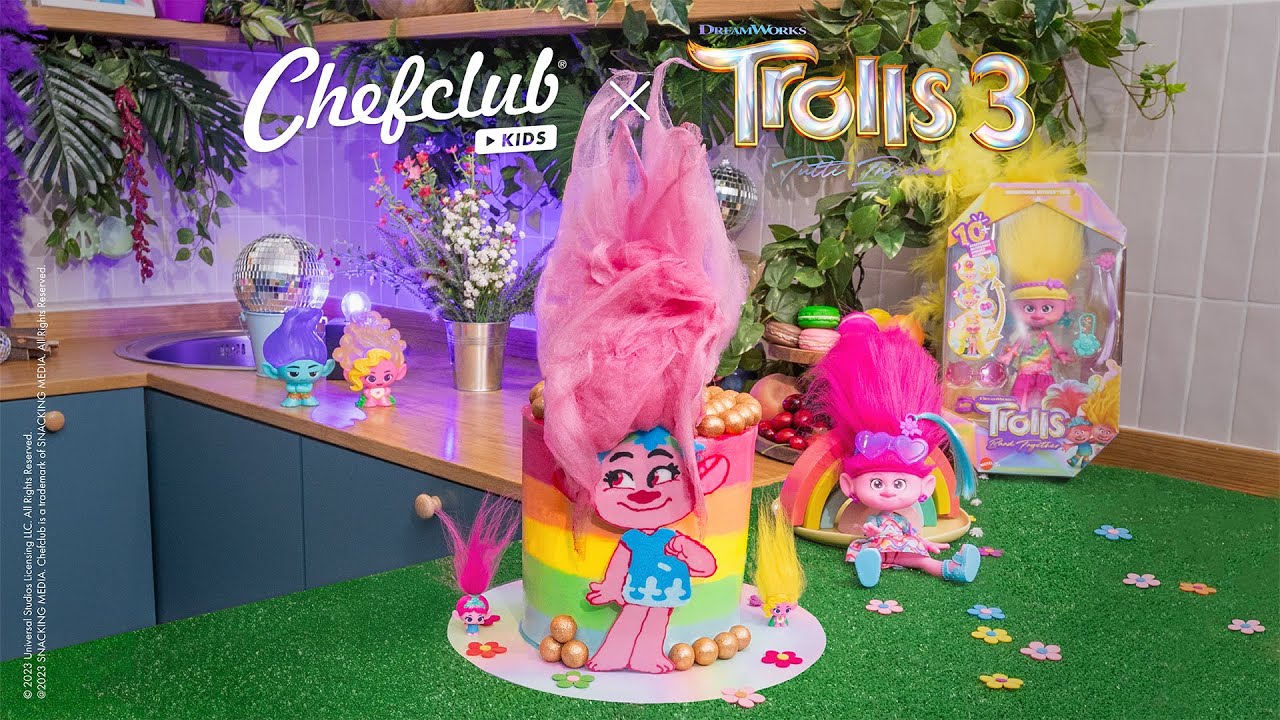 Prepara una torta arcobaleno di Poppy per festeggiare l'uscita di Trolls 3 con stile!