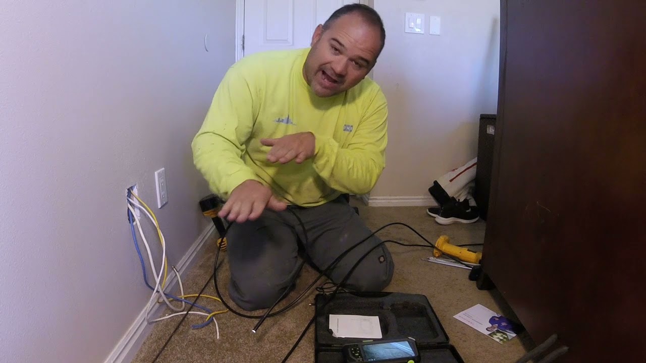 MAD SKILLS! A pro installs wire from the attic to the basement. Part 1
