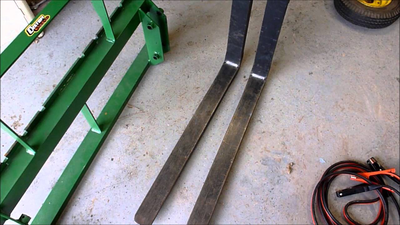 John Deere X748 with 45 Loader Forks