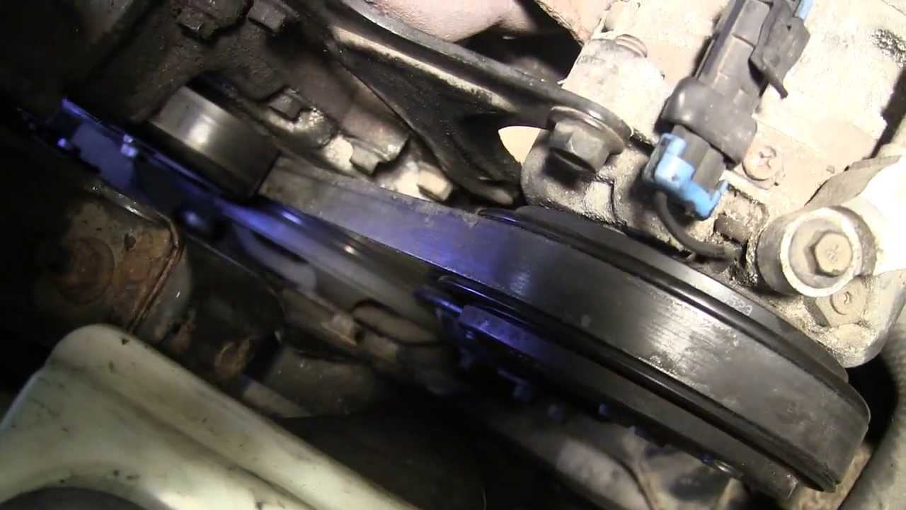 Belt tensioner replacement on a Saturn