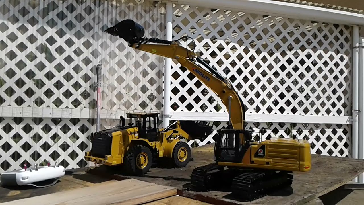 Kabolite 1/16 K966 loader ,Kabolite K336GC excavator 1/16 ,Zetros 6x6 1/14 truck.