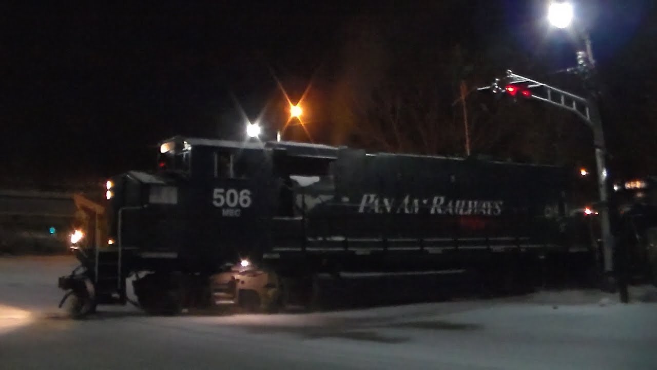 MEC 506 leads PORU with an extreme EMD struggle up the steep grade in Livermore Falls, ME.