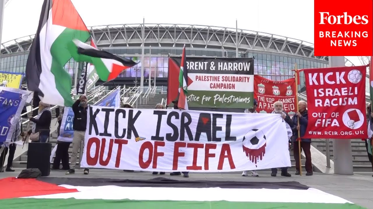 Fans Gather Outside Wembley Stadium In London To Call For Israel's Expulsion From FIFA And UEFA