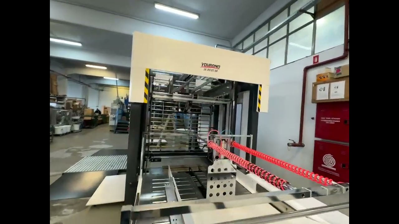 Heavy-duty laimnating machine with flip flop stacker installed in Greece
