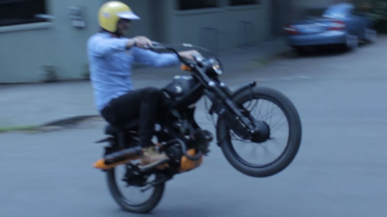Motorcycle Wheelie Stunt: Thor Drake of See See Motor Coffee Portland Honda CL90