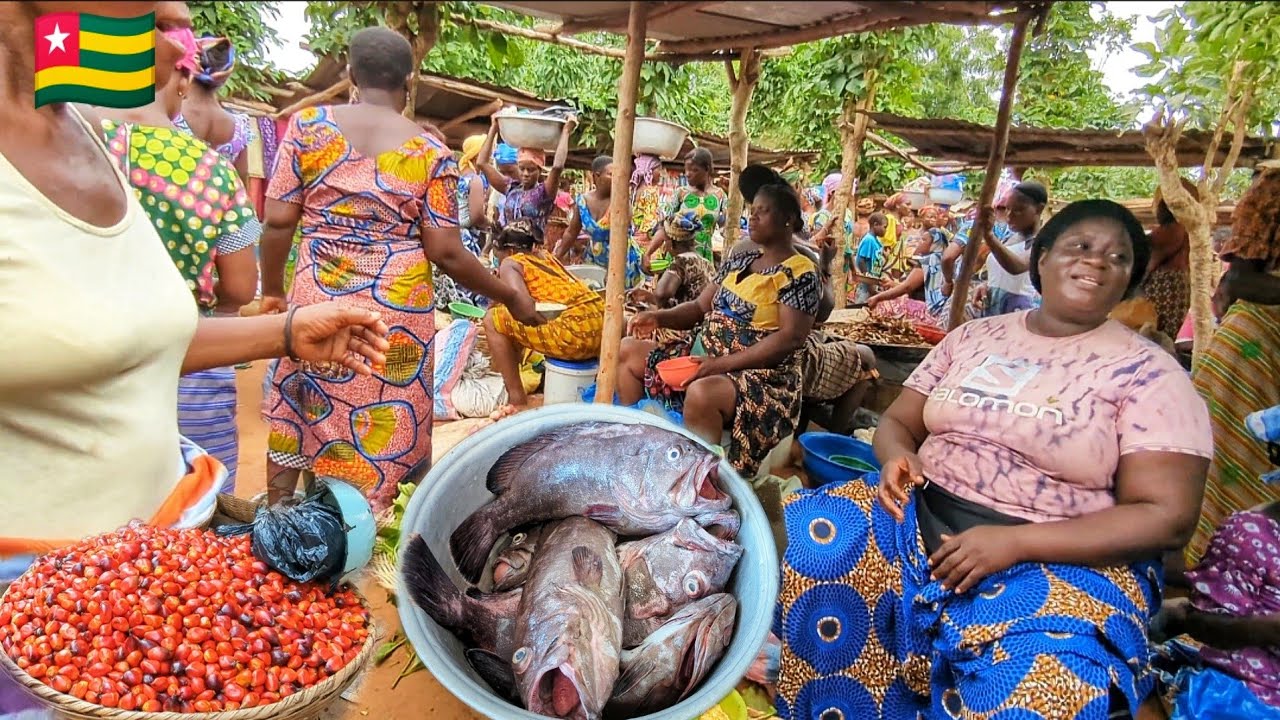 Rural African market day in Togoville. Cost of living in an African village in Togo west Africa 🌍