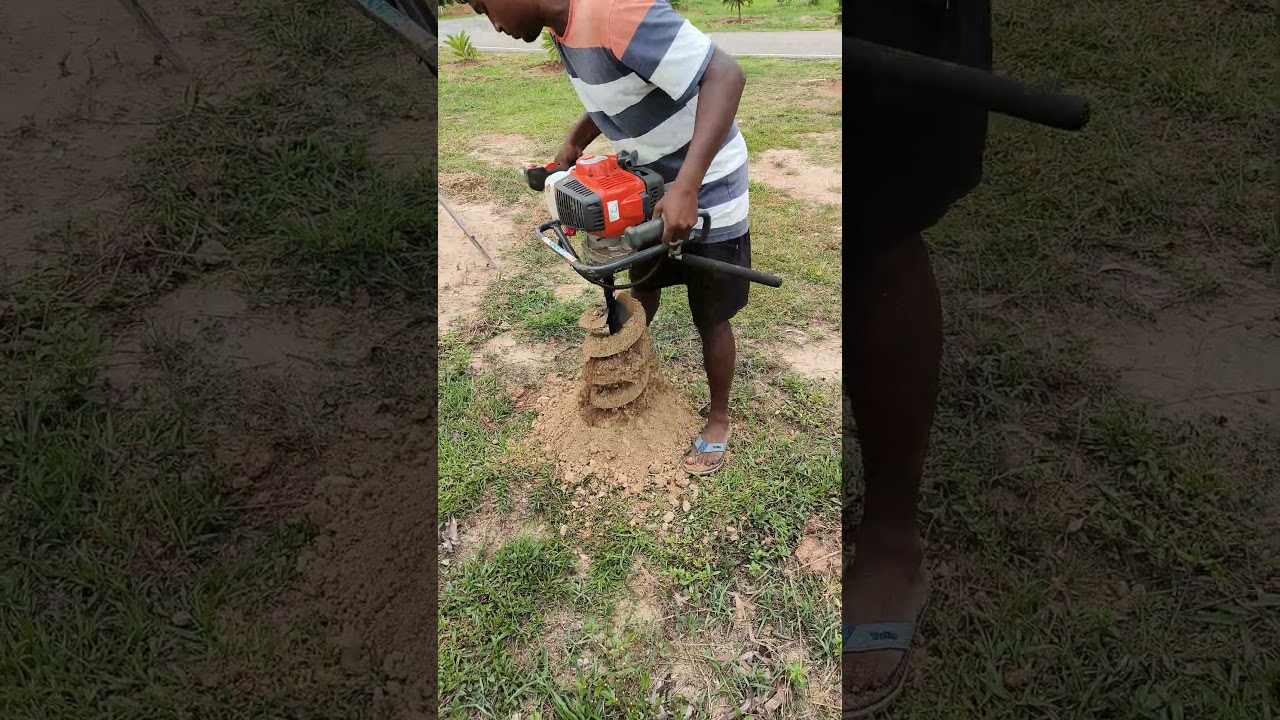Earth auger 541EA Hasqvarna making holes for plantation in farm #earthauger #earthdrill #digger