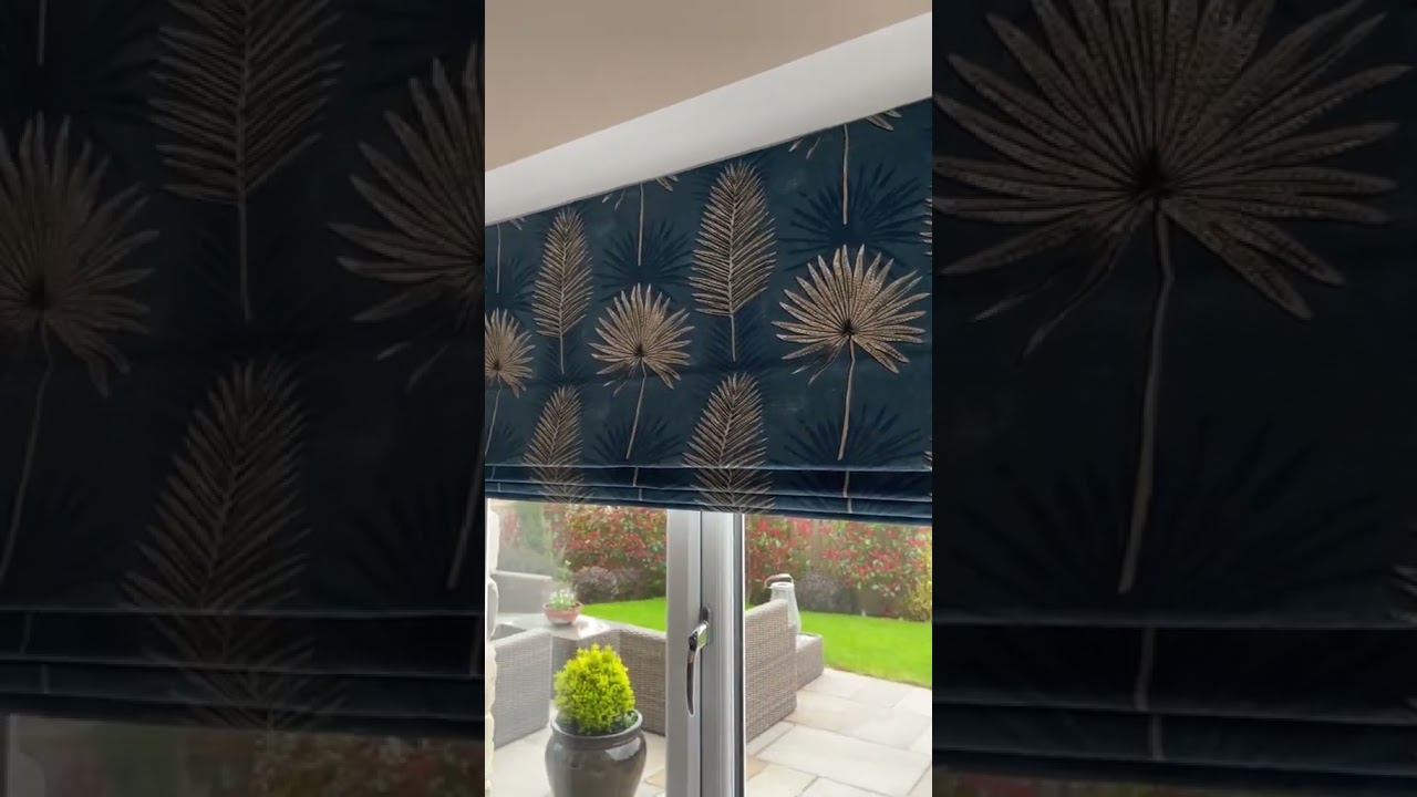 Transform your living room with a Motorised Roman Blind 🤍