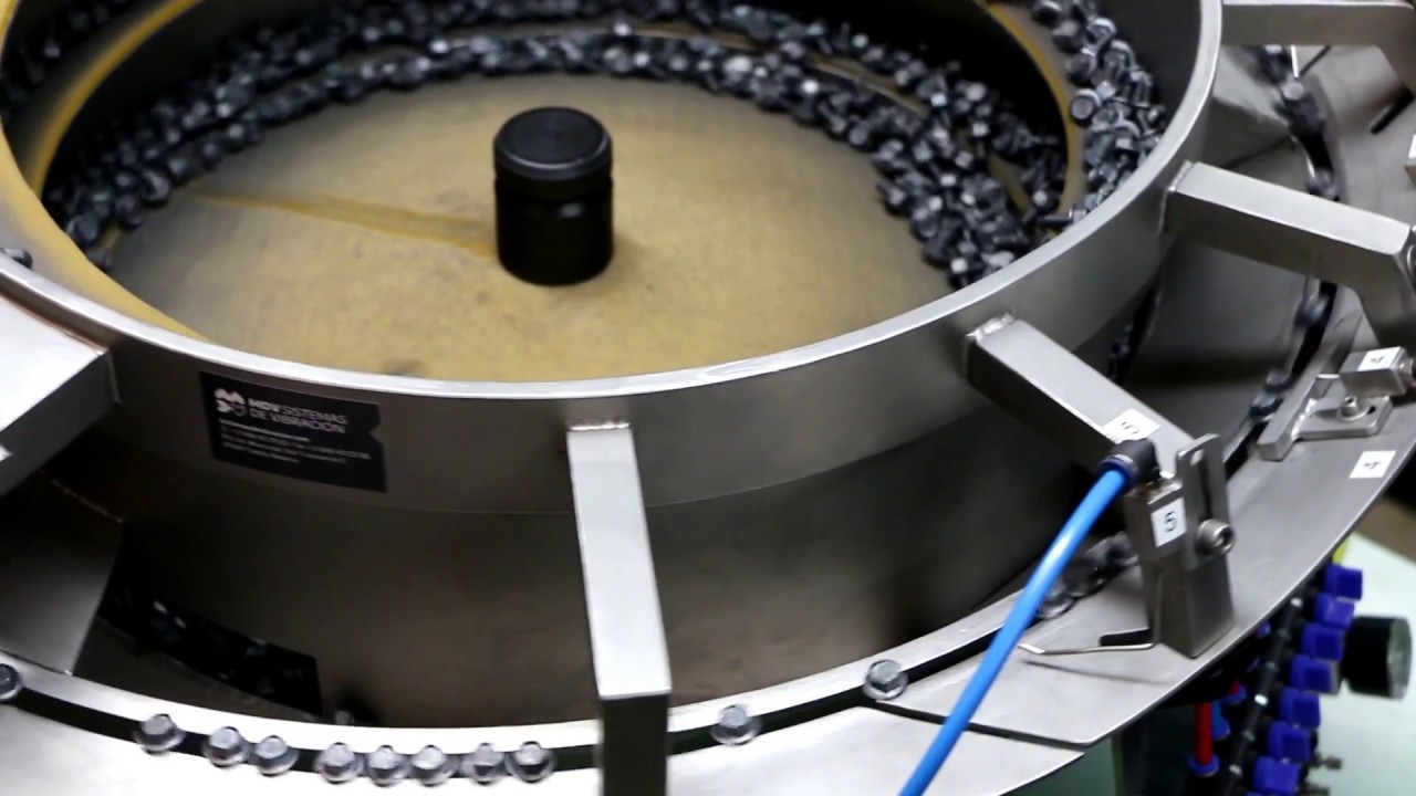 Sistema de alimentación por vibración para 30 tipos de tornillos · MDV