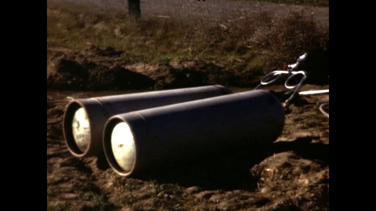 Fertilizing & knocking almonds from trees, Colusa county CA, Post-WWII (Reel8)