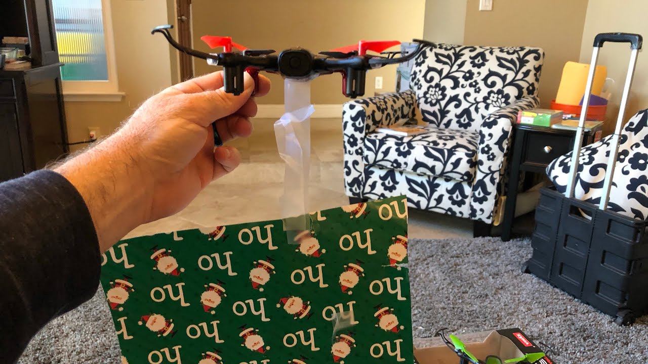 SKY PHANTOM DRONE VS. CHRISTMAS WRAPPING PAPER? Will the drone flip with a Wrapping paper tail?!?!
