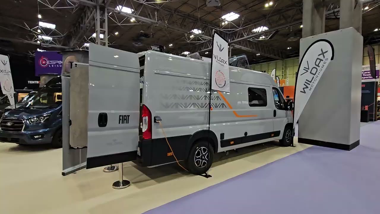 Camper with rear bunk layout for families. Wildax Solaris XL
