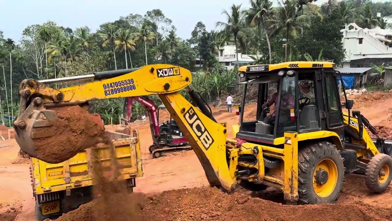 Jcb 3dx loading soil into truck