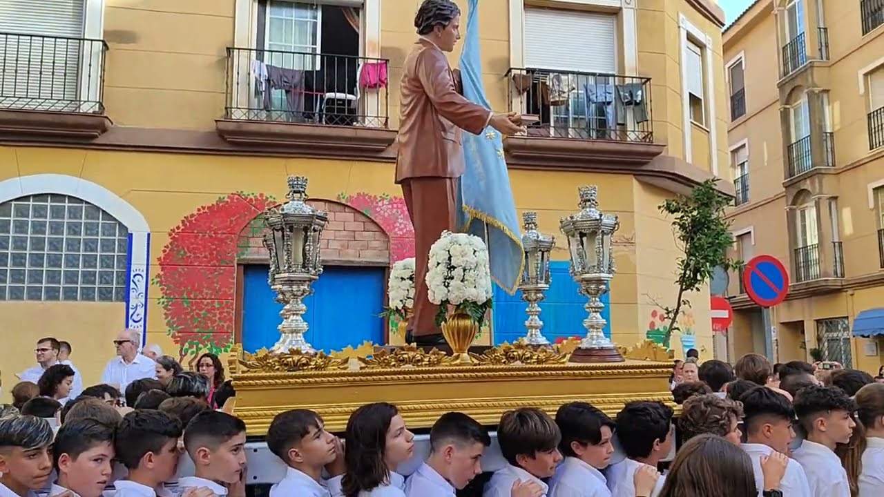 Procesión de María Auxiliadora Málaga 2024. Don Bosco y Domingo Savio por El Molinillo.