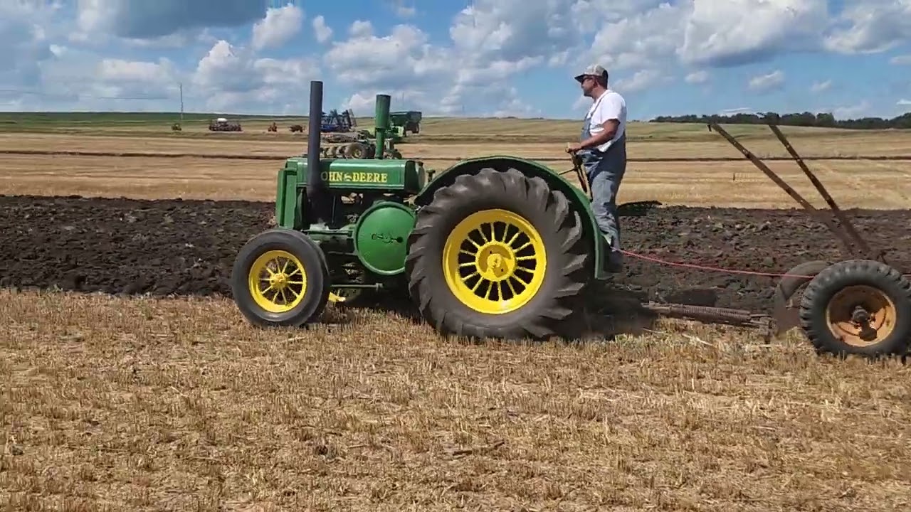 John Deere D plowing