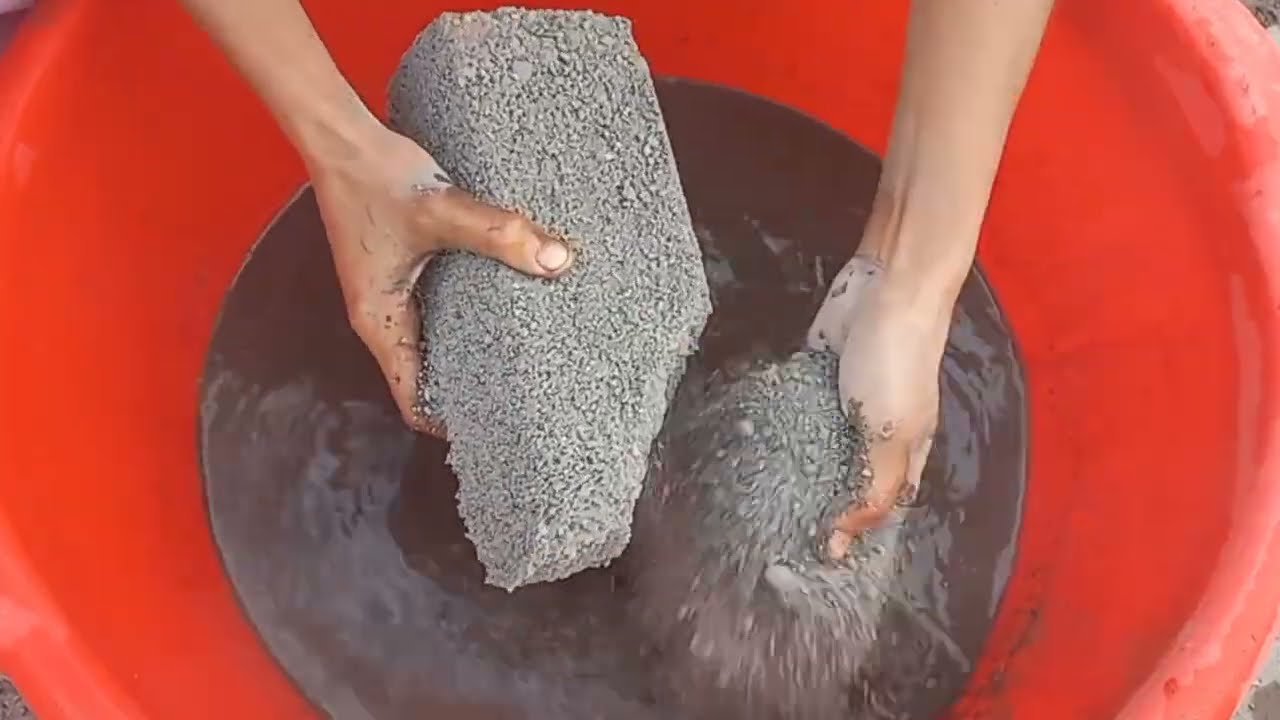 Long Bars of Black concrete dry and water crumbling with pouring | Satisfaction Package