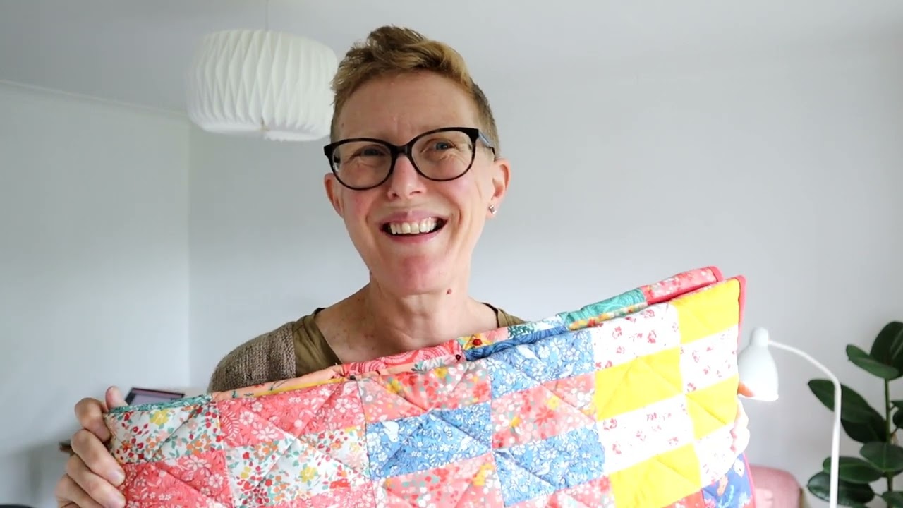 Postcard from Louleigh   Jellyroll Quilt Finished!