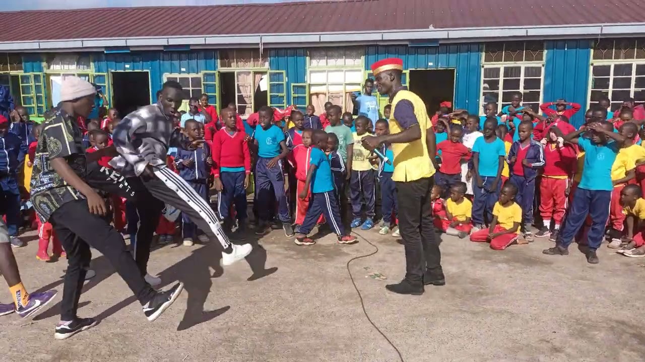 Witty Bakuli performing live at Precious Talent Top School