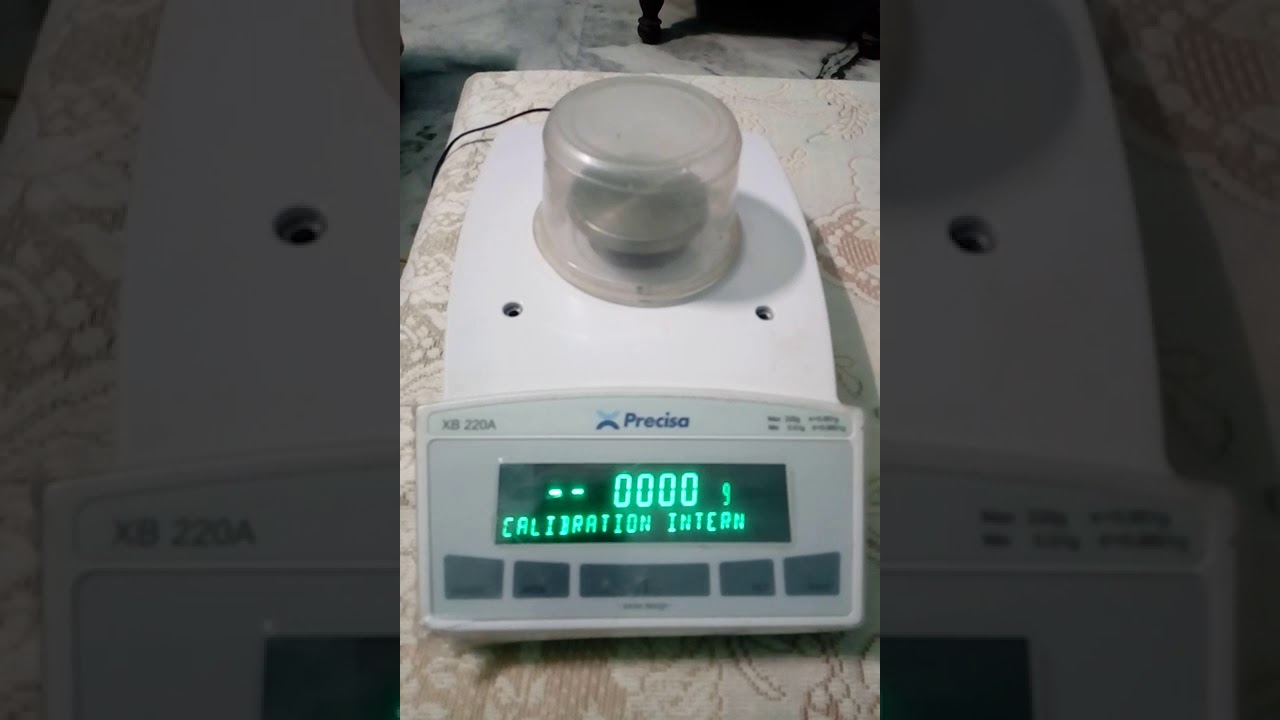 Calibration process of Precisa Balance, model XB220A