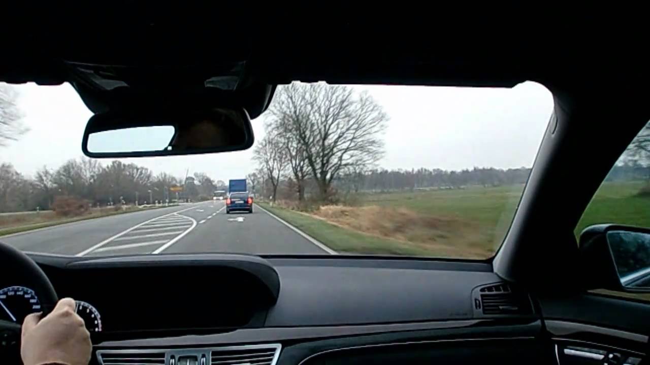 Mercedes S-Class driven on a two-laned highway