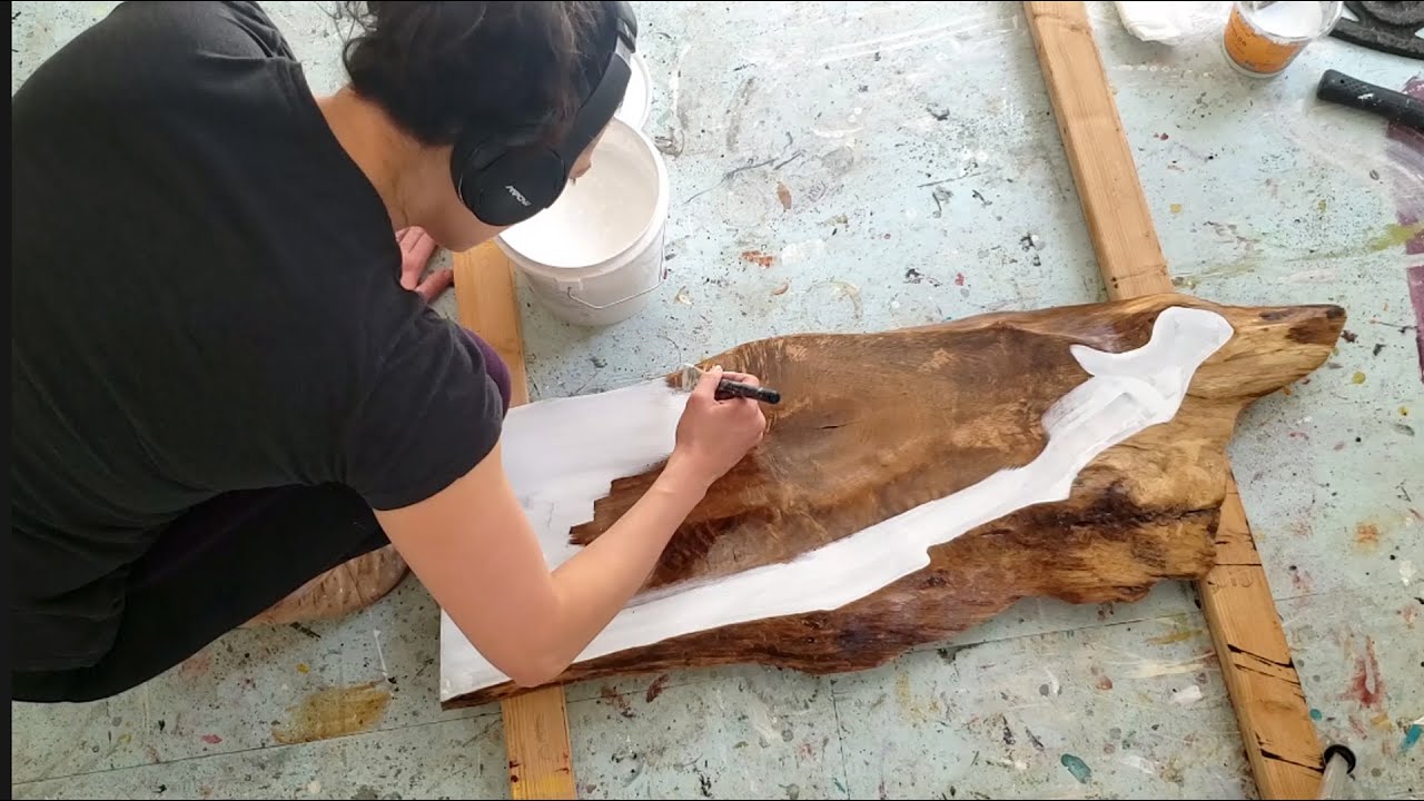 Priming live edge slabs for new paintings!