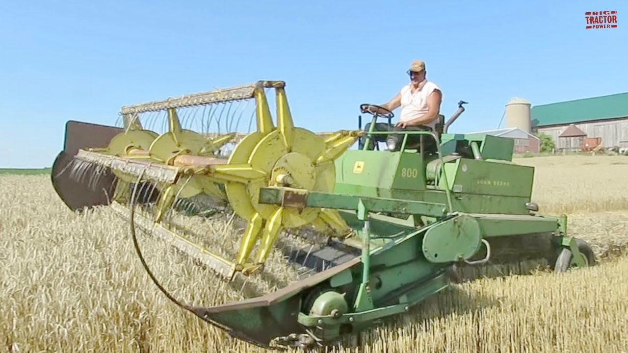 JOHN DEERE 800 Windrower Harvesting Wheat