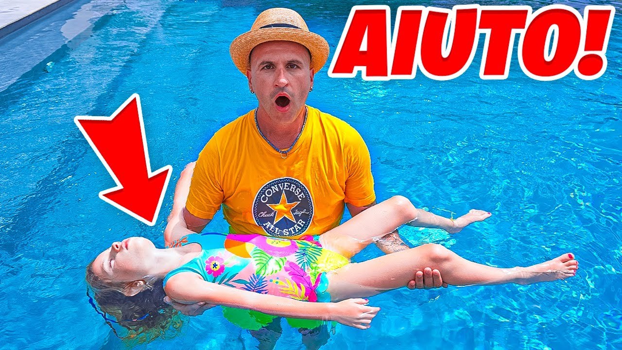 GIORGIA É SVENUTA MENTRE NUOTA IN PISCINA E SI SENTE MALE E PAPA' SALVO SI PRENDE CURA DI LEI!
