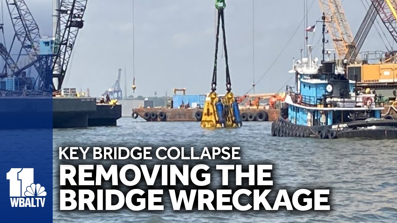 Largest crane, claw removing Key Bridge wreckage