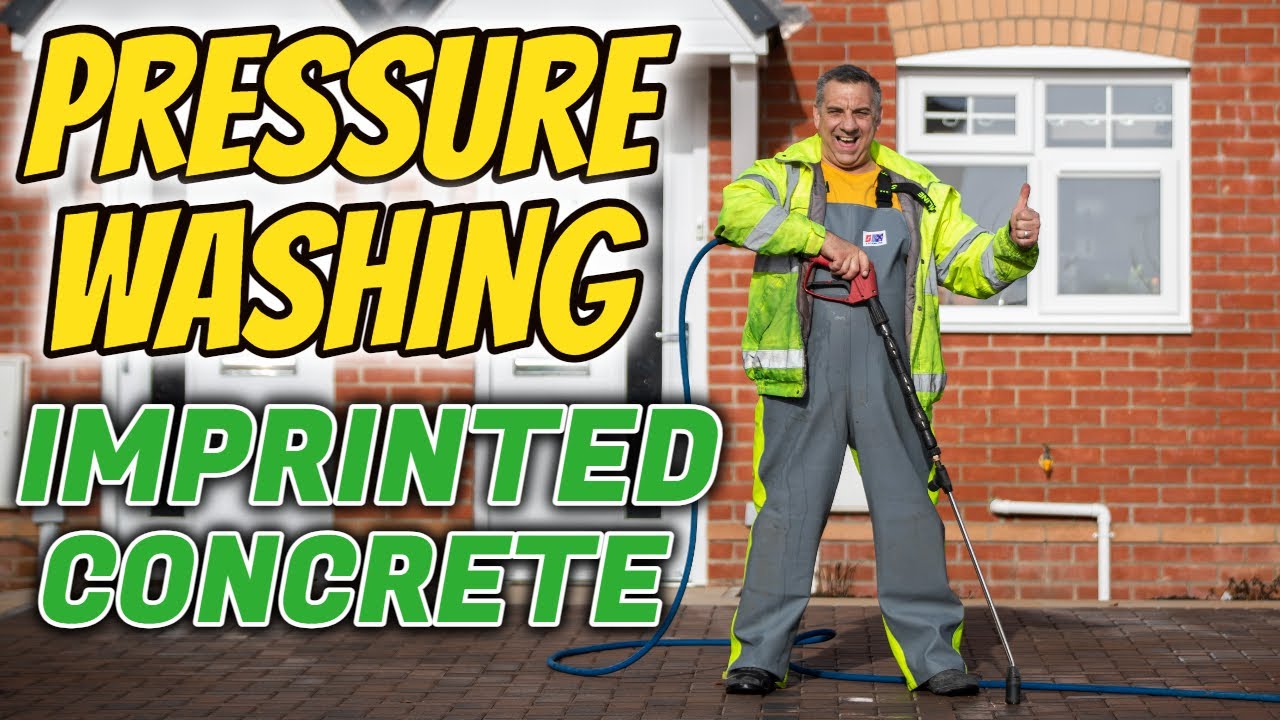 Pressure washing imprinted concrete driveway