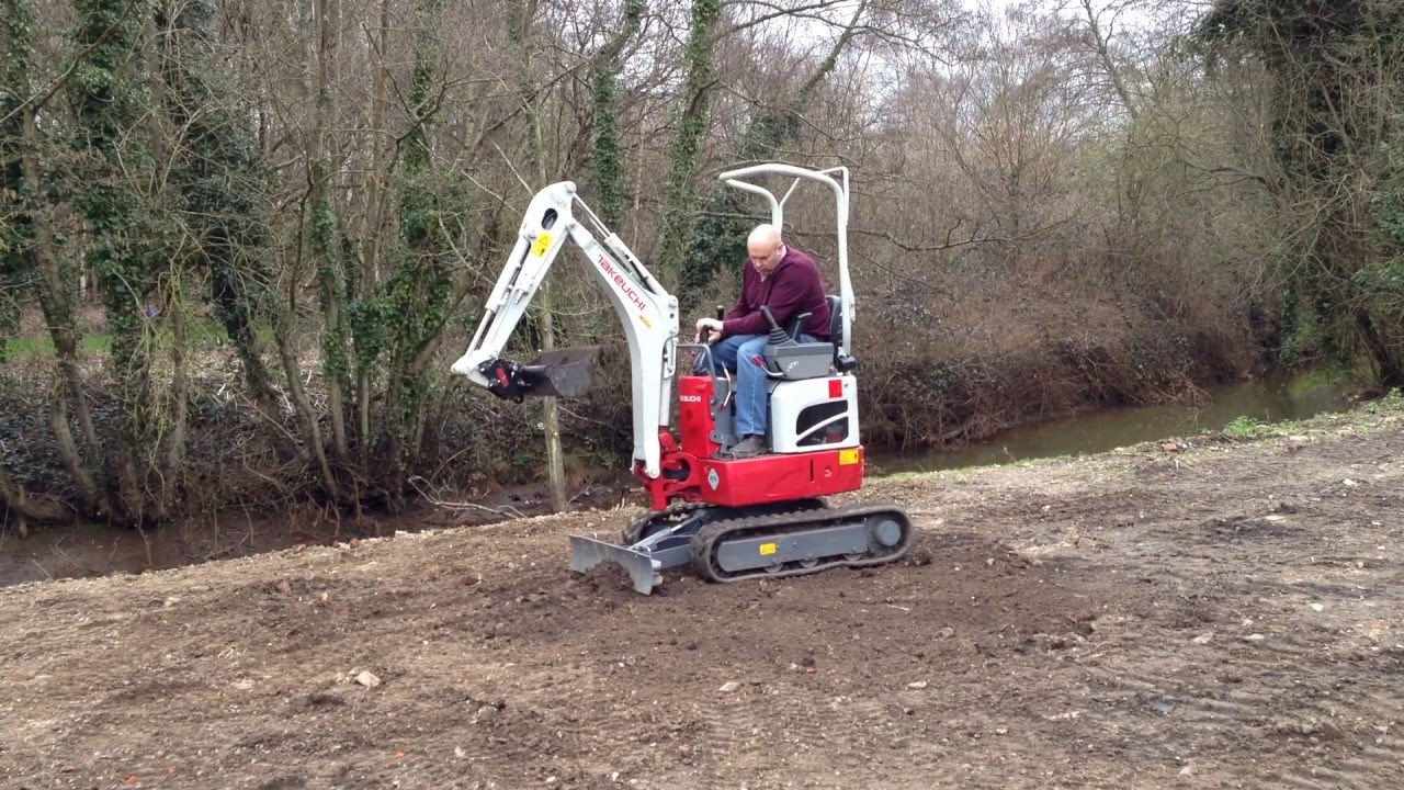 First Try Of The New Takeuchi TB210R Mini Excavator.