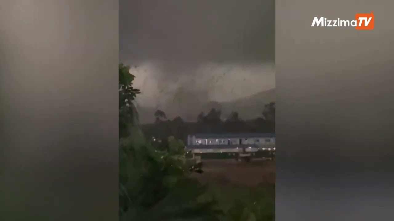 Dark skies and swirling debris as tornado hits Guangzhou, China