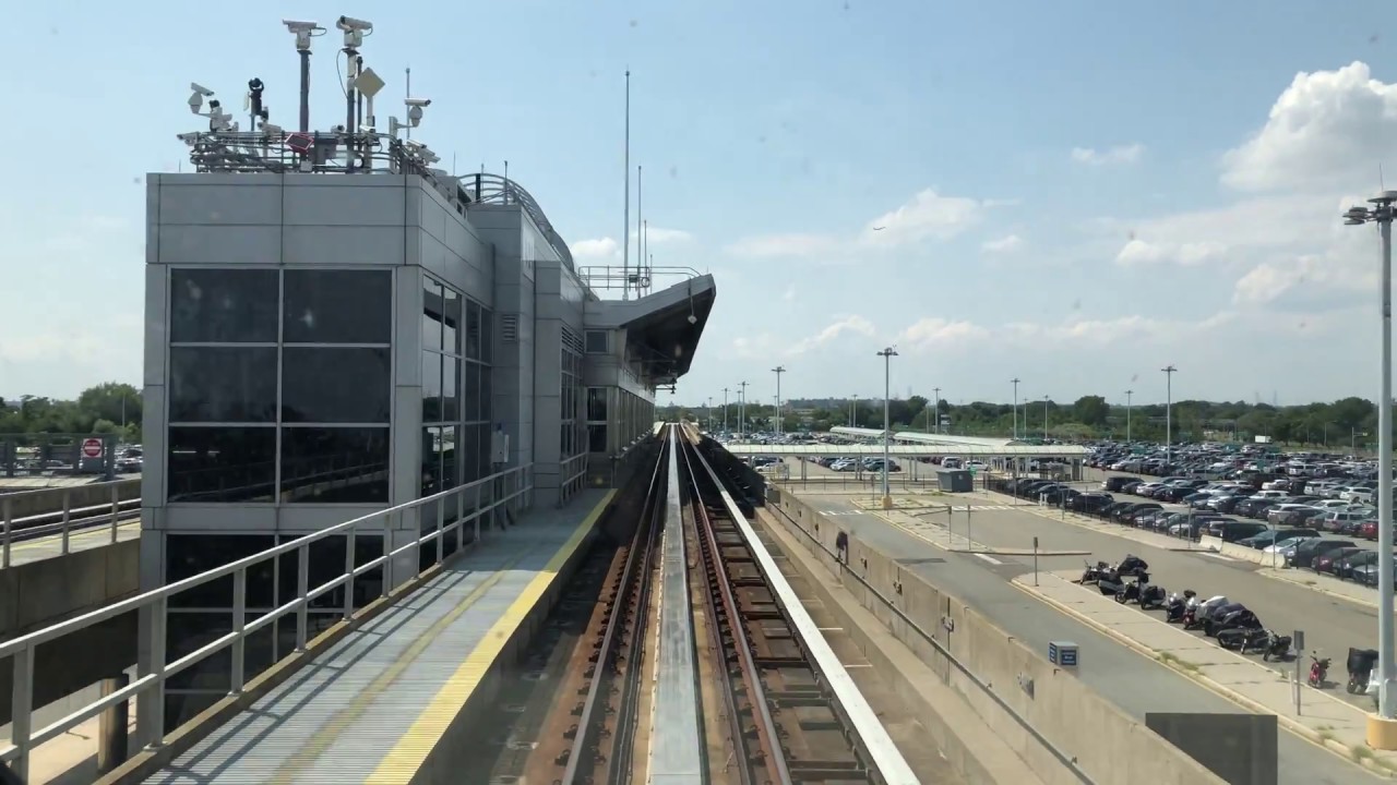⁴ᴷ Поездка на поезде AirTrain из аэропорта имени Джона Кеннеди от Терминала 1 до Ховард-Бич — вид...