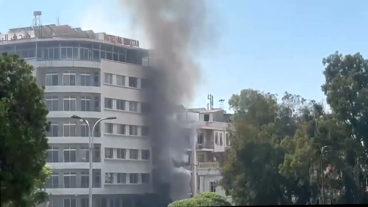 Explosions in Syria's Damascus during Macron visit