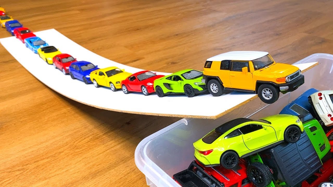 Diecast Model Cars Moving Up The Slope Into The Box #13