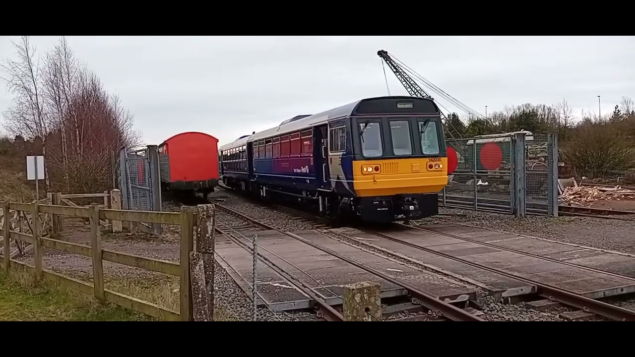 First North Western Class 142030 leaving Brownhills West 
