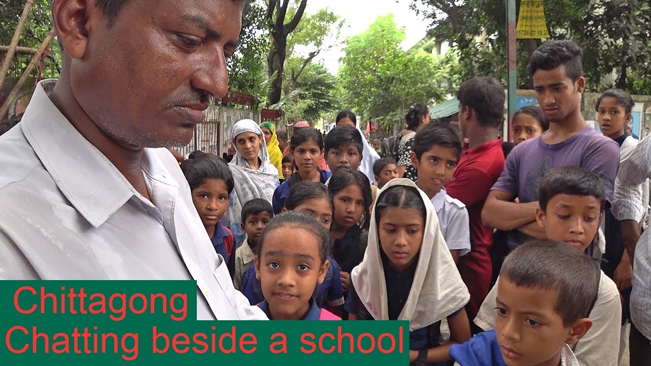 Chatting beside a school Chittagong Bangladesh