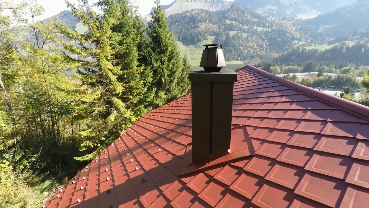 Dachsanierung in Schwarzsee mit Prefa Rauten oxydrot P.10