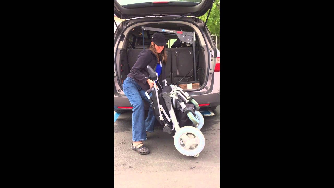 AN EZ-LITE CRUISER WITH A HARMAR LIFT IN A HONDA ODYSSEY