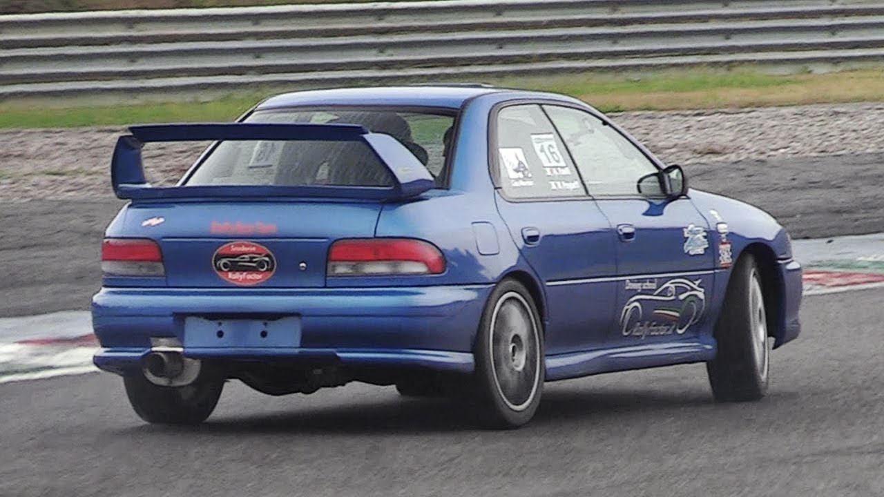 Pushing a screaming Subaru Impreza GC8 to the limit on a humid & slippery track (w/ OnBoard)!